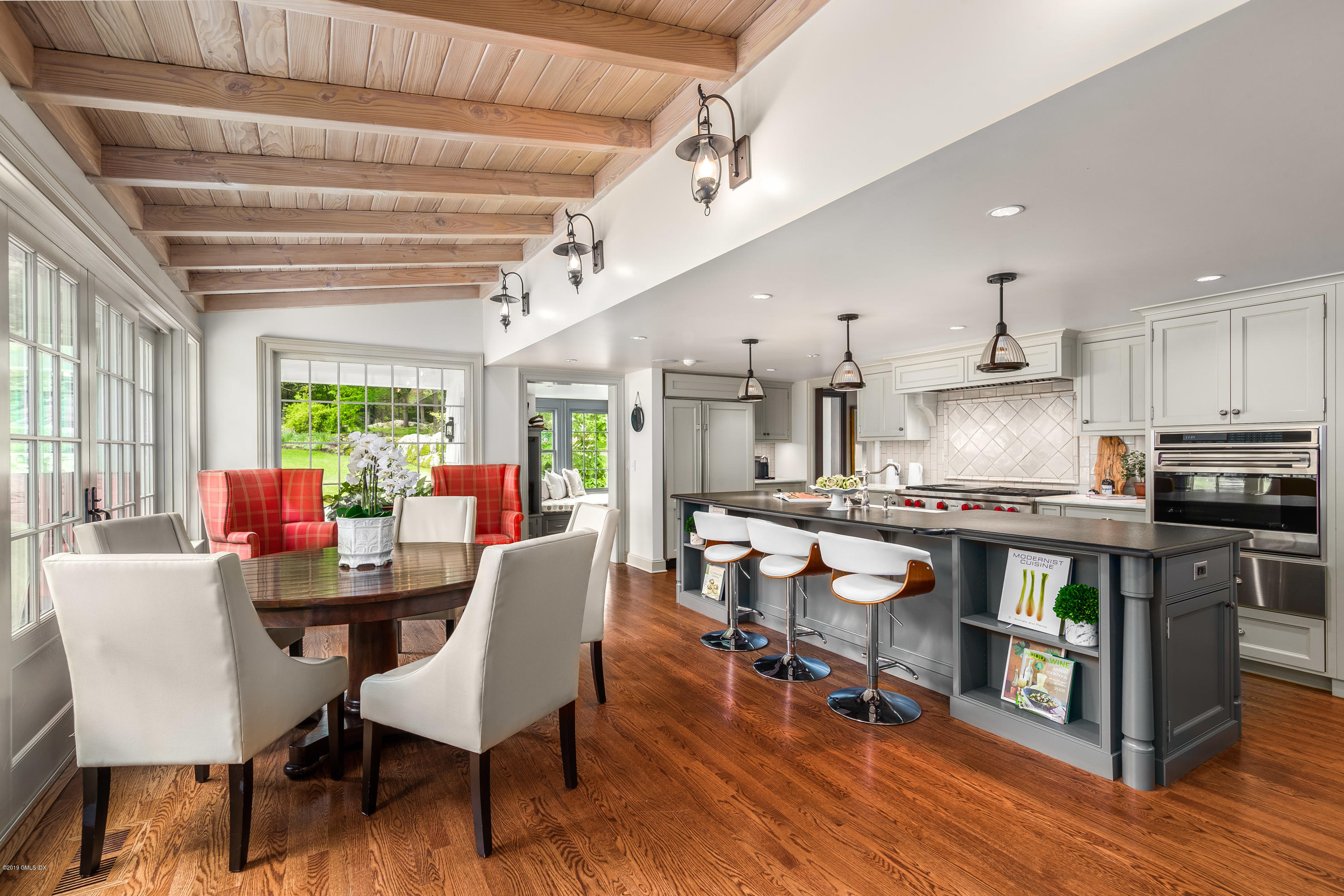 68 Doubling Road Greenwich, CT 06830 - Photo 6 of 40 a view of a dining room with furniture window and wooden floor