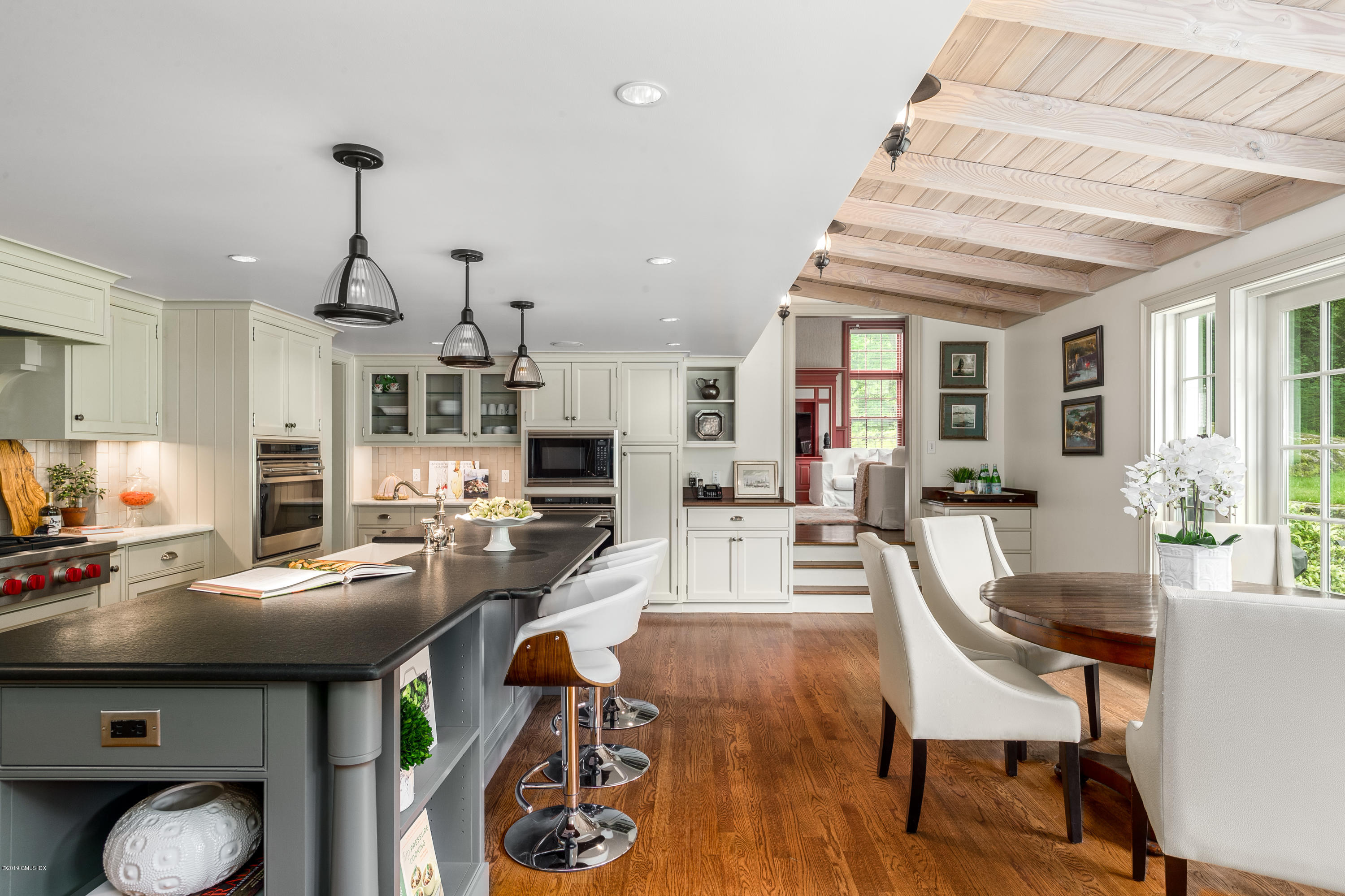 68 Doubling Road Greenwich, CT 06830 - Photo 7 of 40 a living room with furniture a dining table and chairs