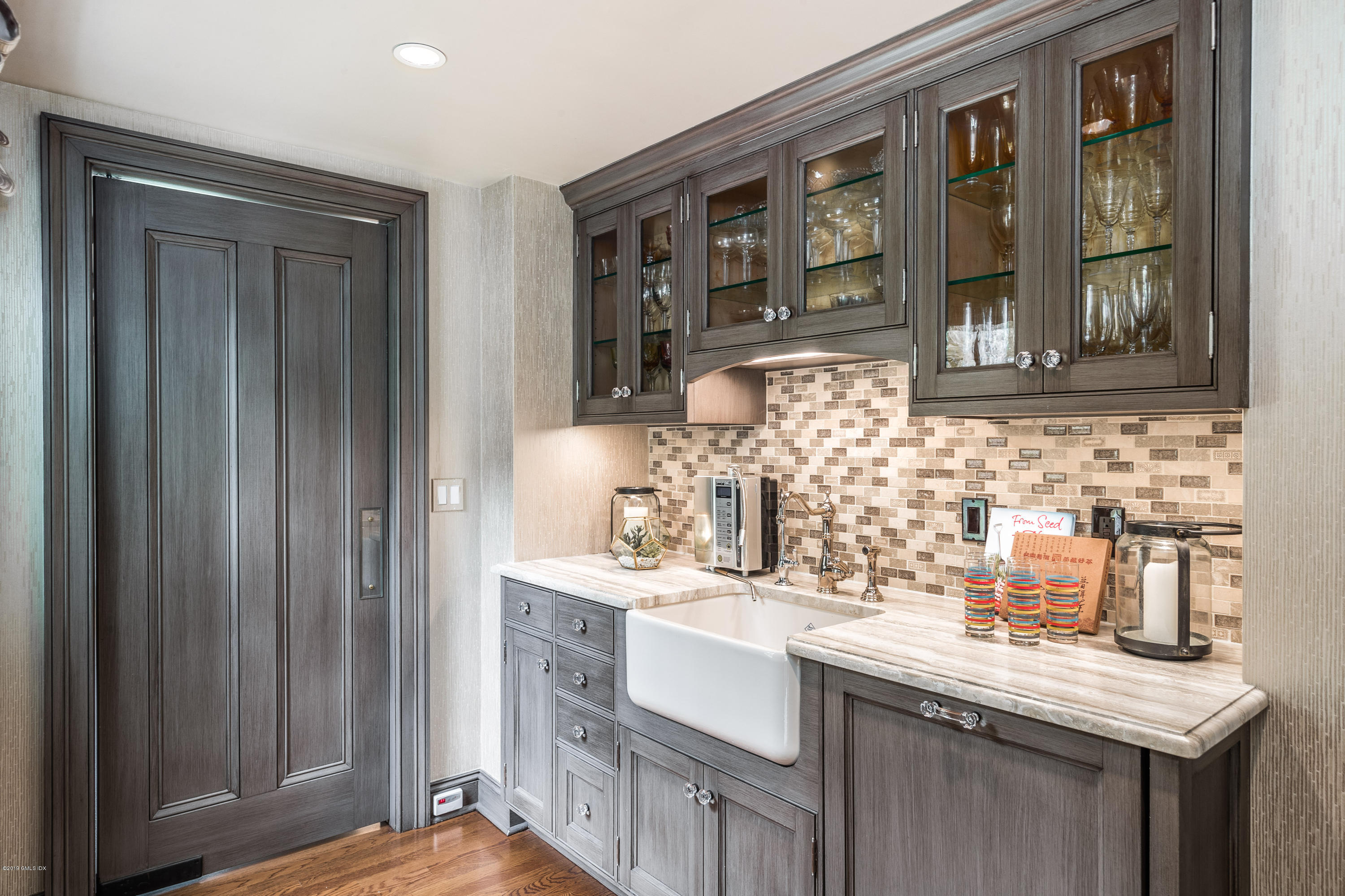 68 Doubling Road Greenwich, CT 06830 - Photo 10 of 40 a bathroom with a sink and a mirror