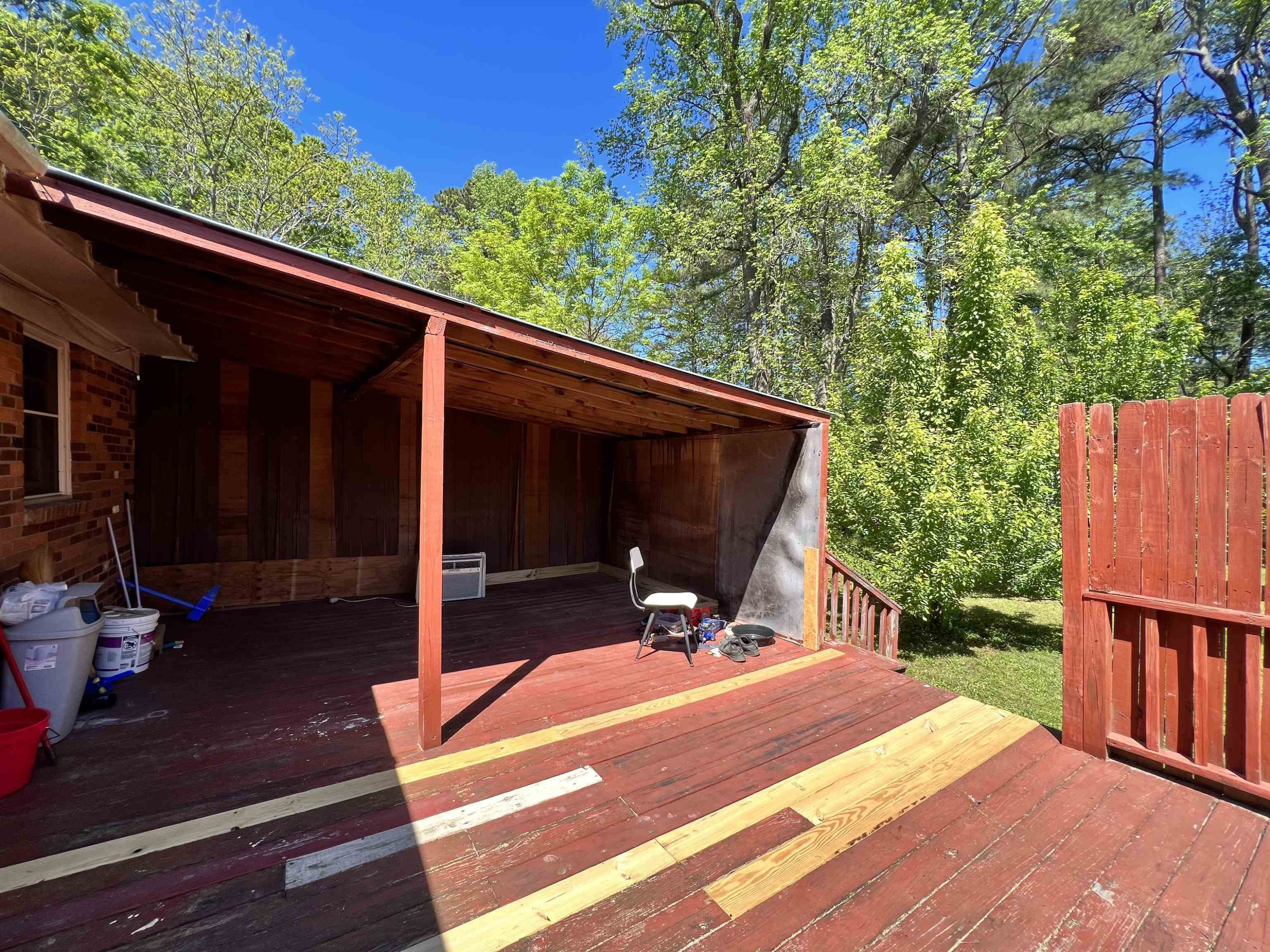 624 Woodland Road Raleigh, NC 27603 - Photo 23 of 29 a view of backyard with tv and outdoor seating