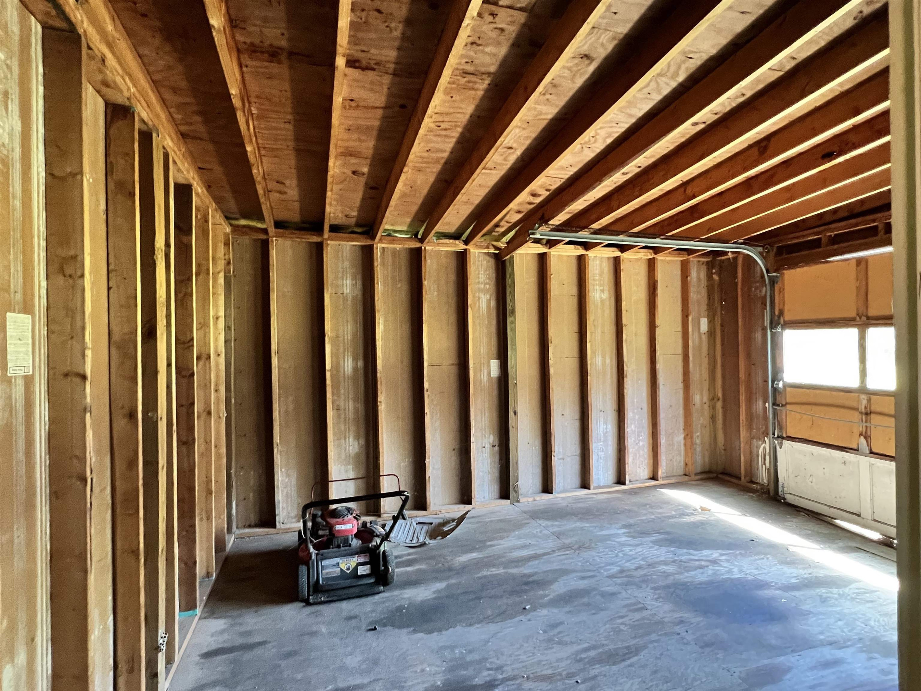 624 Woodland Road Raleigh, NC 27603 - Photo 28 of 29 a view of a room with furniture and windows