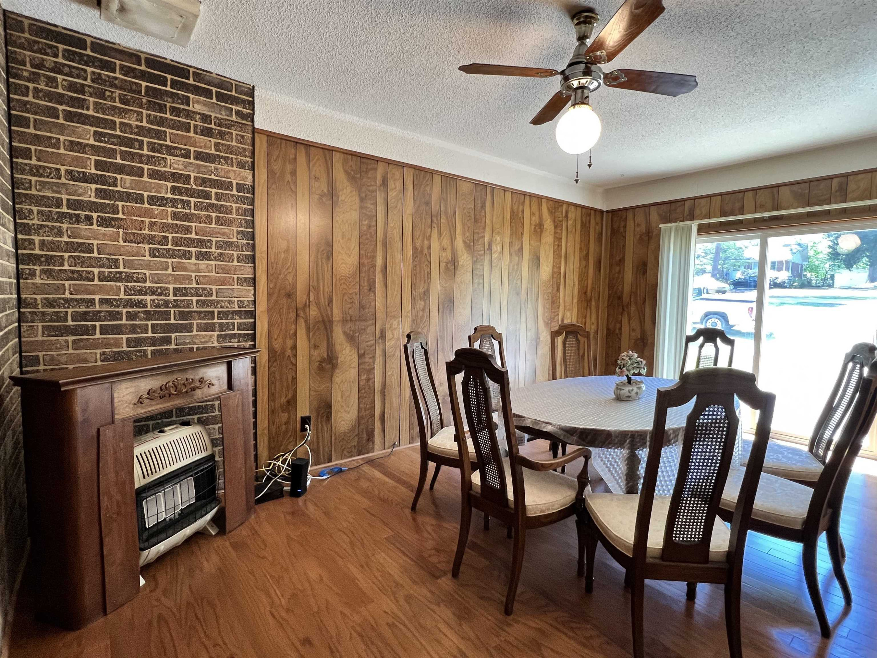 624 Woodland Road Raleigh, NC 27603 - Photo 4 of 29 a view of a dining room with furniture and window