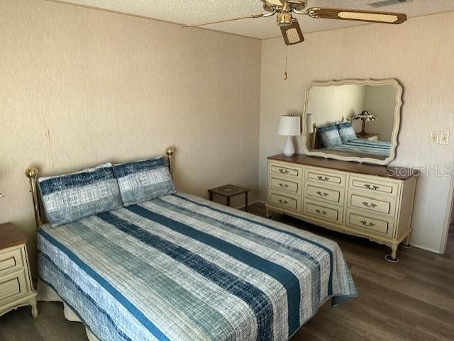 76 Eagle Circle Ellenton, FL 34222 - Photo 14 of 22 a bedroom with a bed and ceiling fan