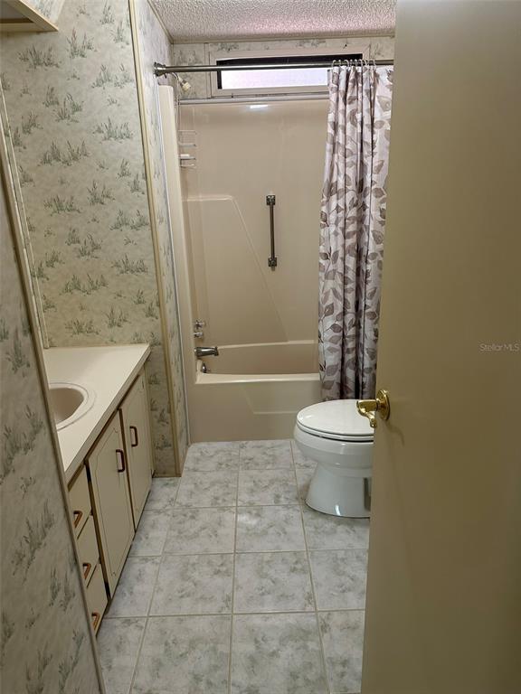76 Eagle Circle Ellenton, FL 34222 - Photo 15 of 22 a bathroom with a sink a toilet and shower