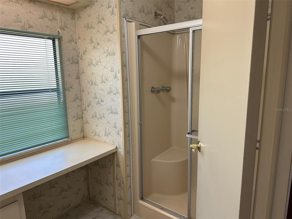 76 Eagle Circle Ellenton, FL 34222 - Photo 19 of 22 a bathroom with a shower and a sink