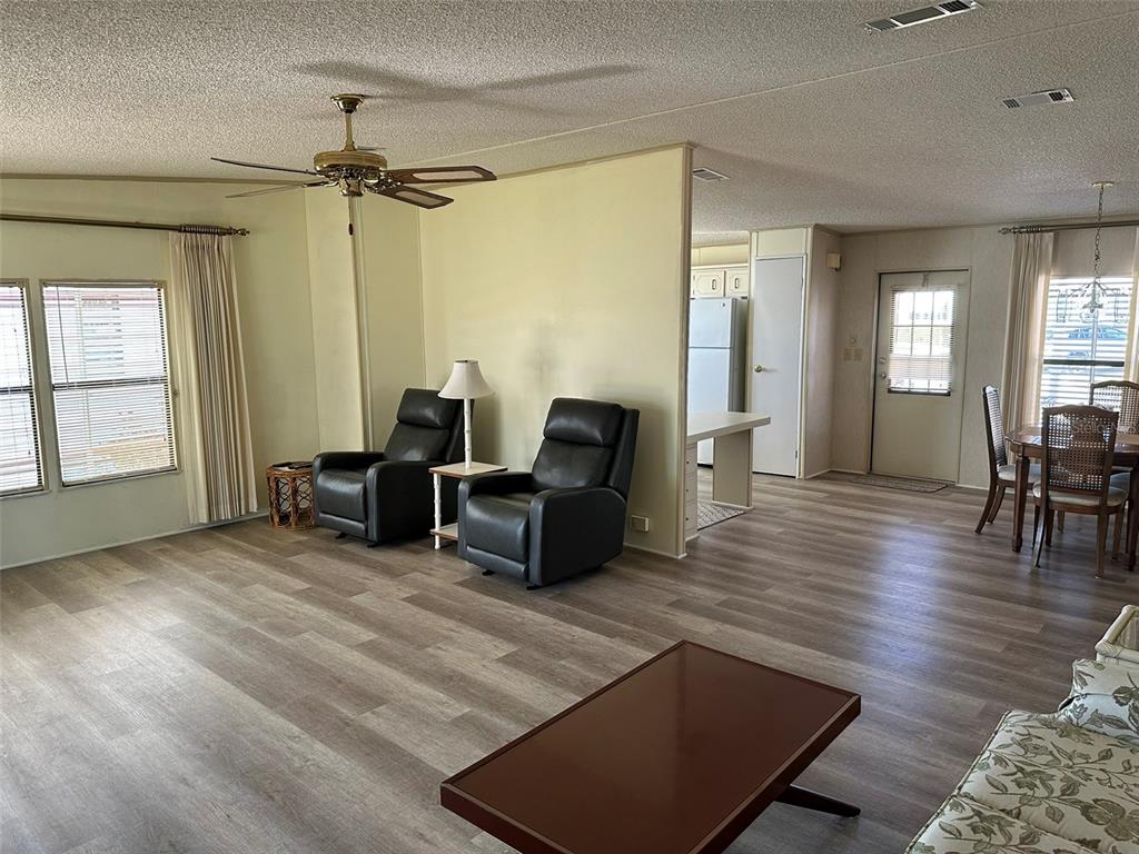 76 Eagle Circle Ellenton, FL 34222 - Photo 8 of 22 a living room with furniture and wooden floor