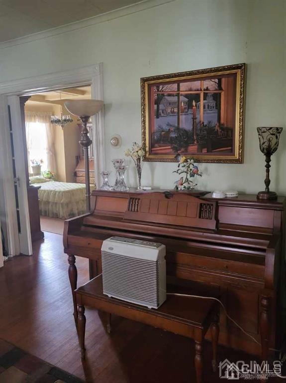 352 Front Street Dunellen, NJ 08812 - Photo 12 of 46 a living room with furniture and a painting on the wall
