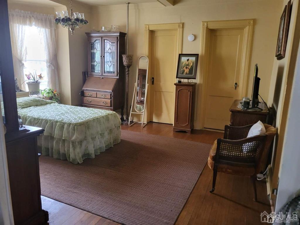 352 Front Street Dunellen, NJ 08812 - Photo 16 of 46 a room with pool table and flat screen tv