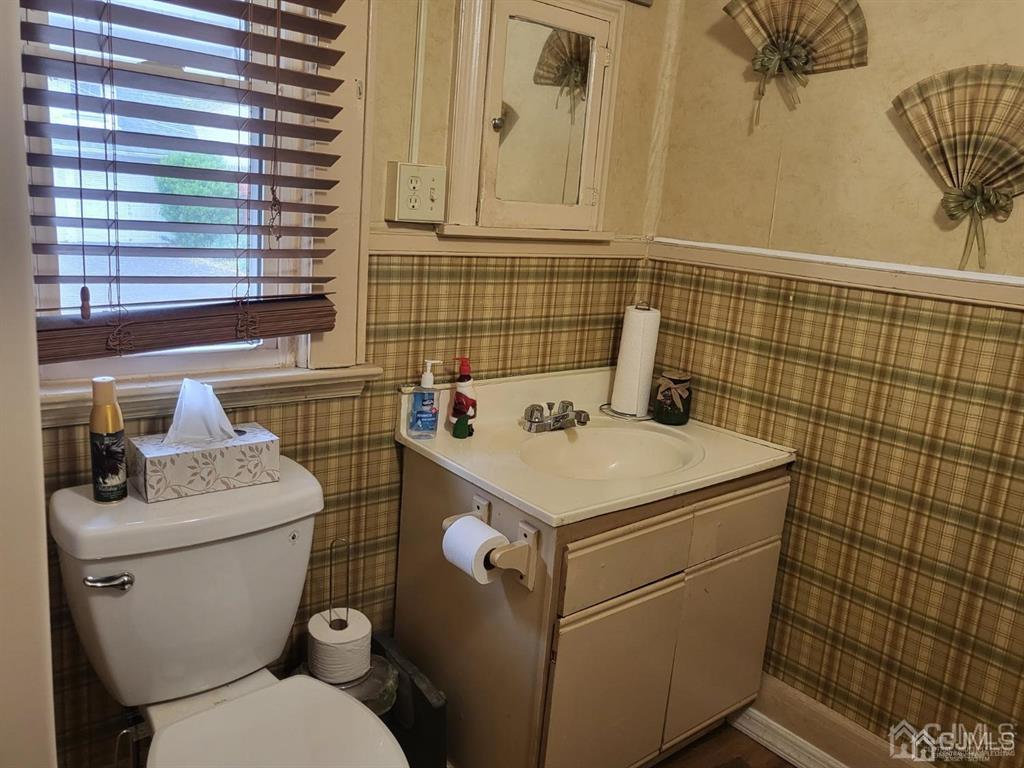 352 Front Street Dunellen, NJ 08812 - Photo 18 of 46 a bathroom with a sink toilet and shower