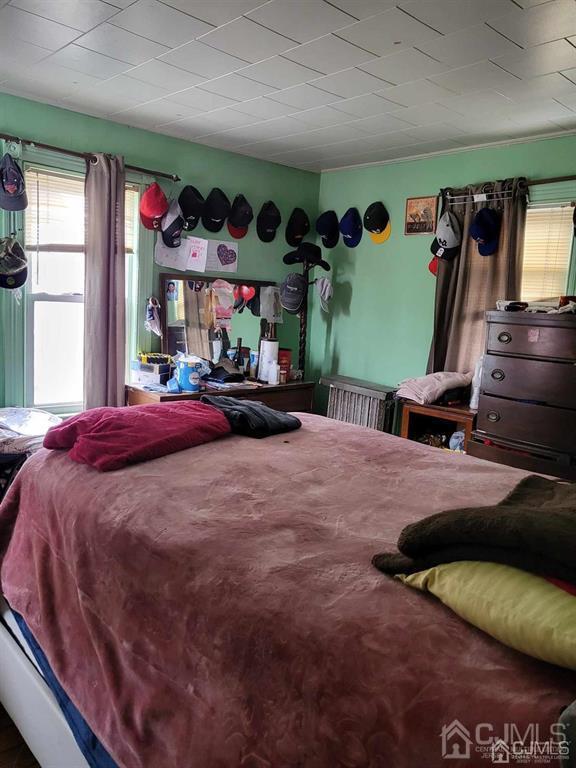 352 Front Street Dunellen, NJ 08812 - Photo 31 of 46 a bedroom with bed and window