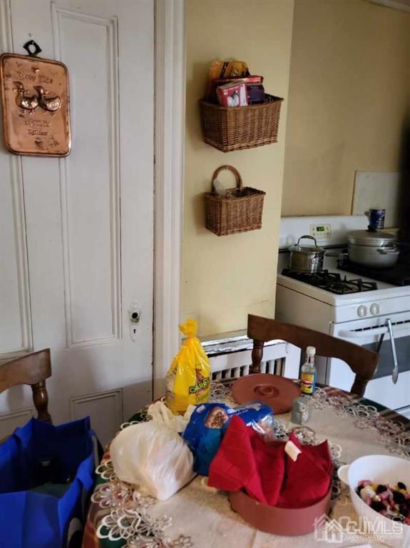 352 Front Street Dunellen, NJ 08812 - Photo 37 of 46 a bedroom with a bed and cabinets