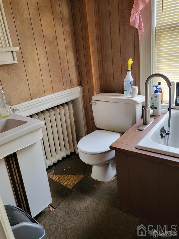 352 Front Street Dunellen, NJ 08812 - Photo 38 of 46 a bathroom with a sink toilet and vanity