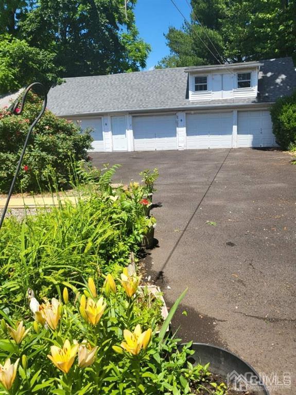 352 Front Street Dunellen, NJ 08812 - Photo 5 of 46 a backyard of a house with a yard and outdoor seating