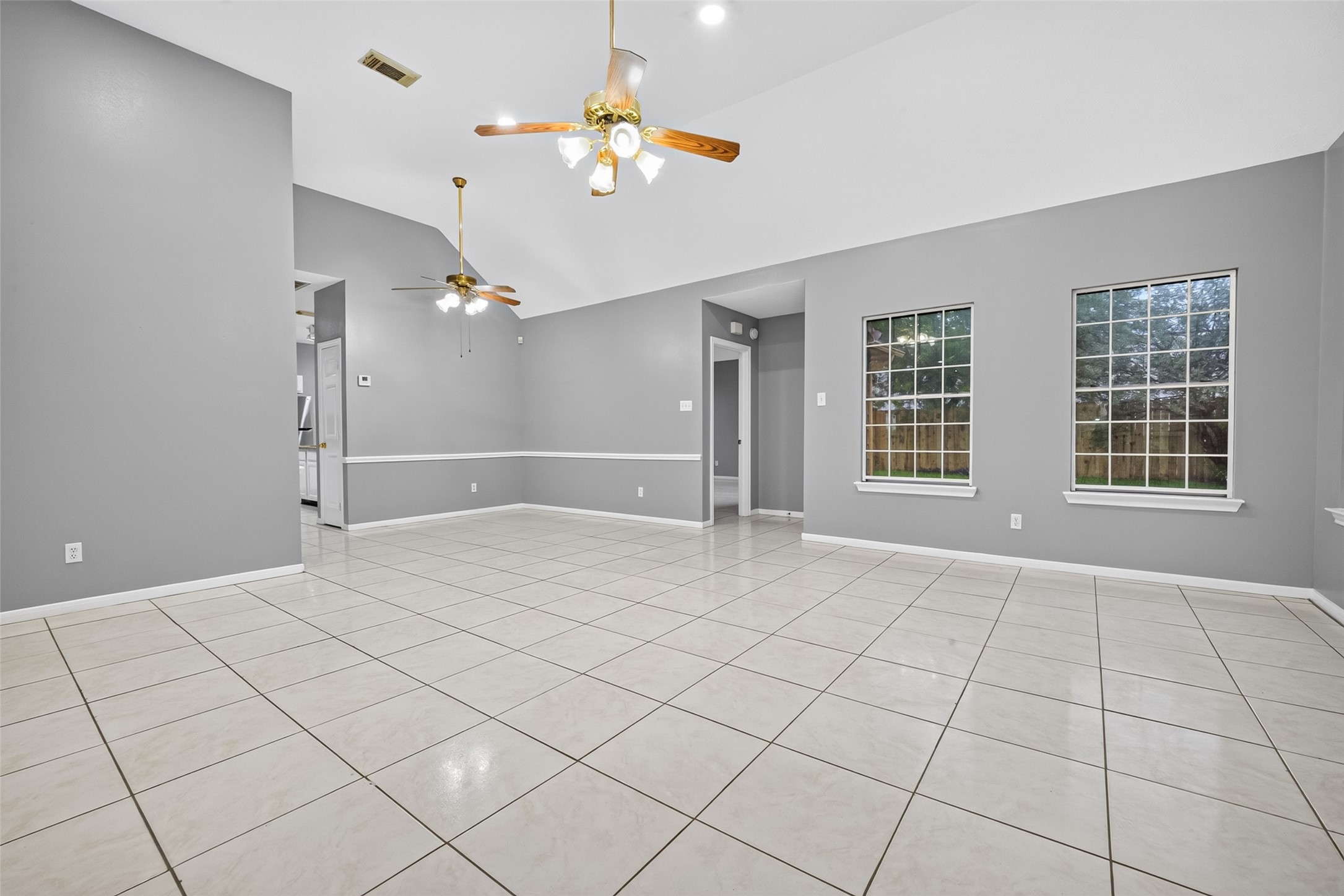 13607 Sable Lane Houston, TX 77014 - Photo 9 of 46 a view of an empty room with a window