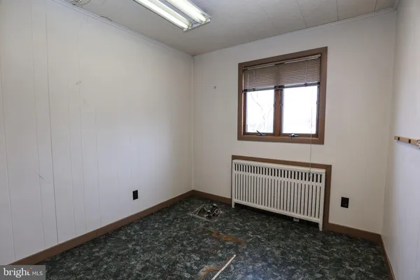 a view of a room with a window