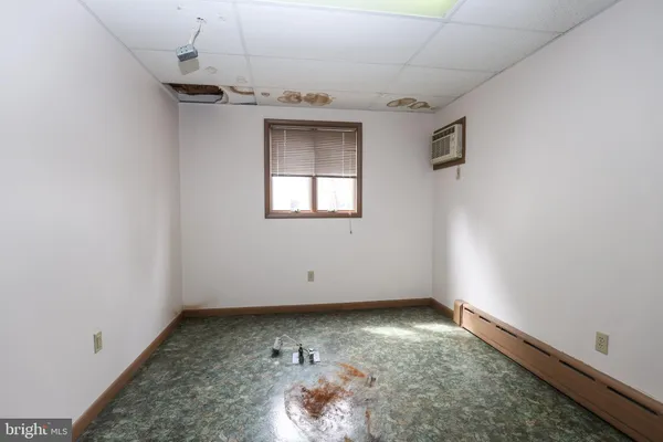 an empty room with a workbench