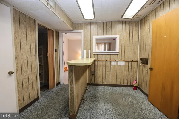 a view of hallway with washer and dryer
