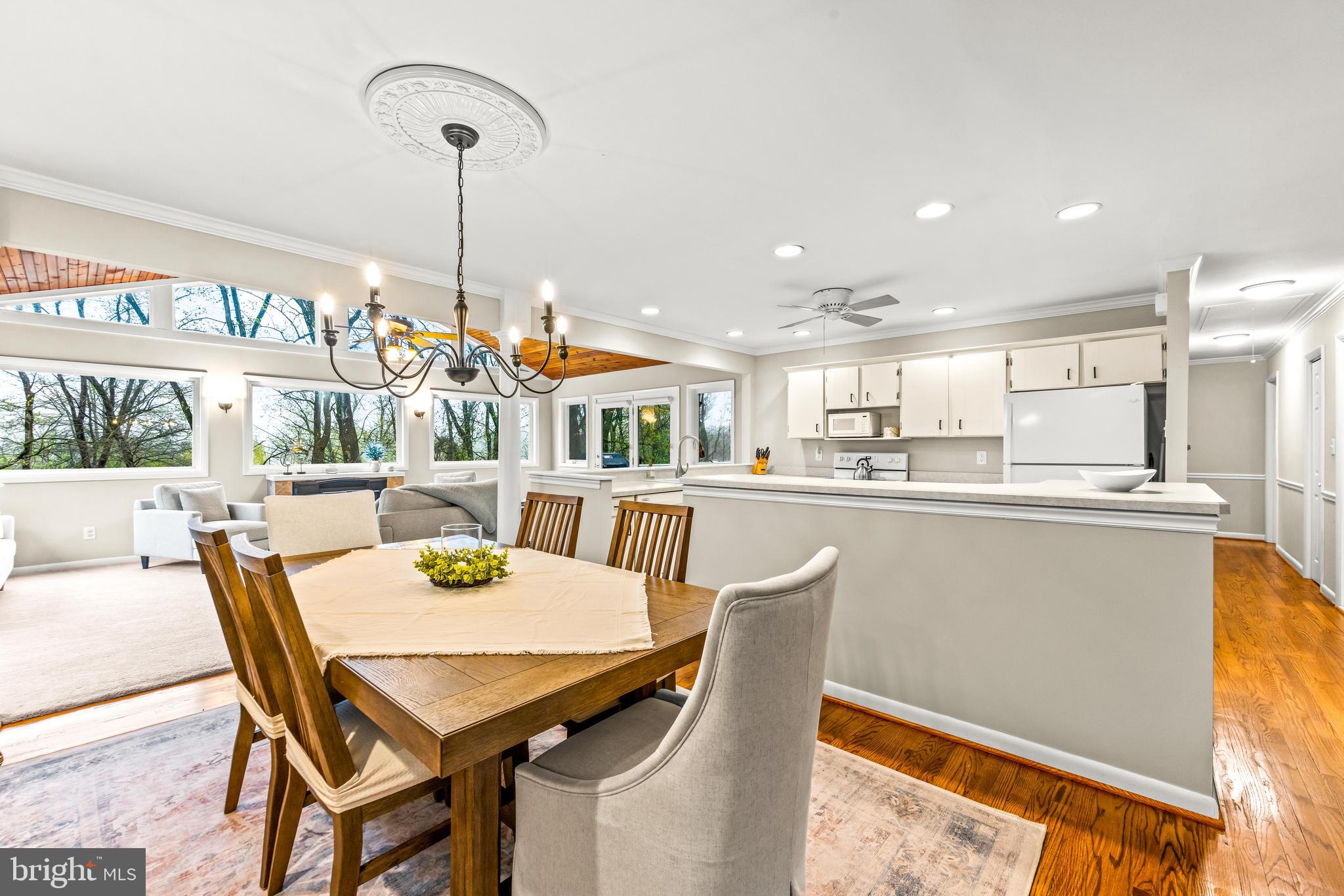 1205 Mill Creek Road Fallston, MD 21047 - Photo 13 of 53 a dining room with furniture and a floor to ceiling window
