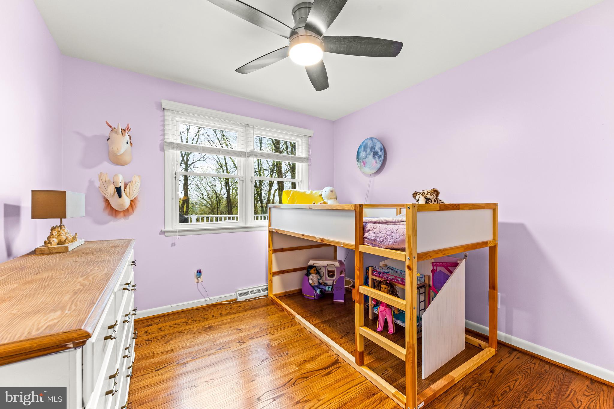 1205 Mill Creek Road Fallston, MD 21047 - Photo 23 of 53 a bedroom with a bed and a chandelier