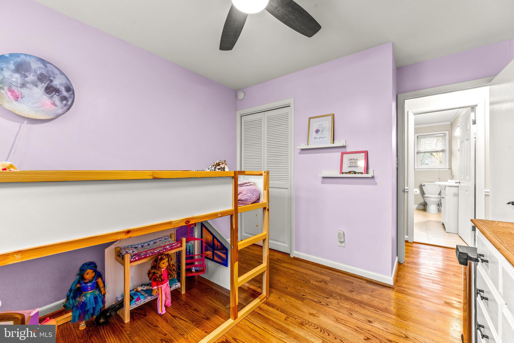 1205 Mill Creek Road Fallston, MD 21047 - Photo 24 of 53 a view of an empty room with wooden floor and a ceiling fan