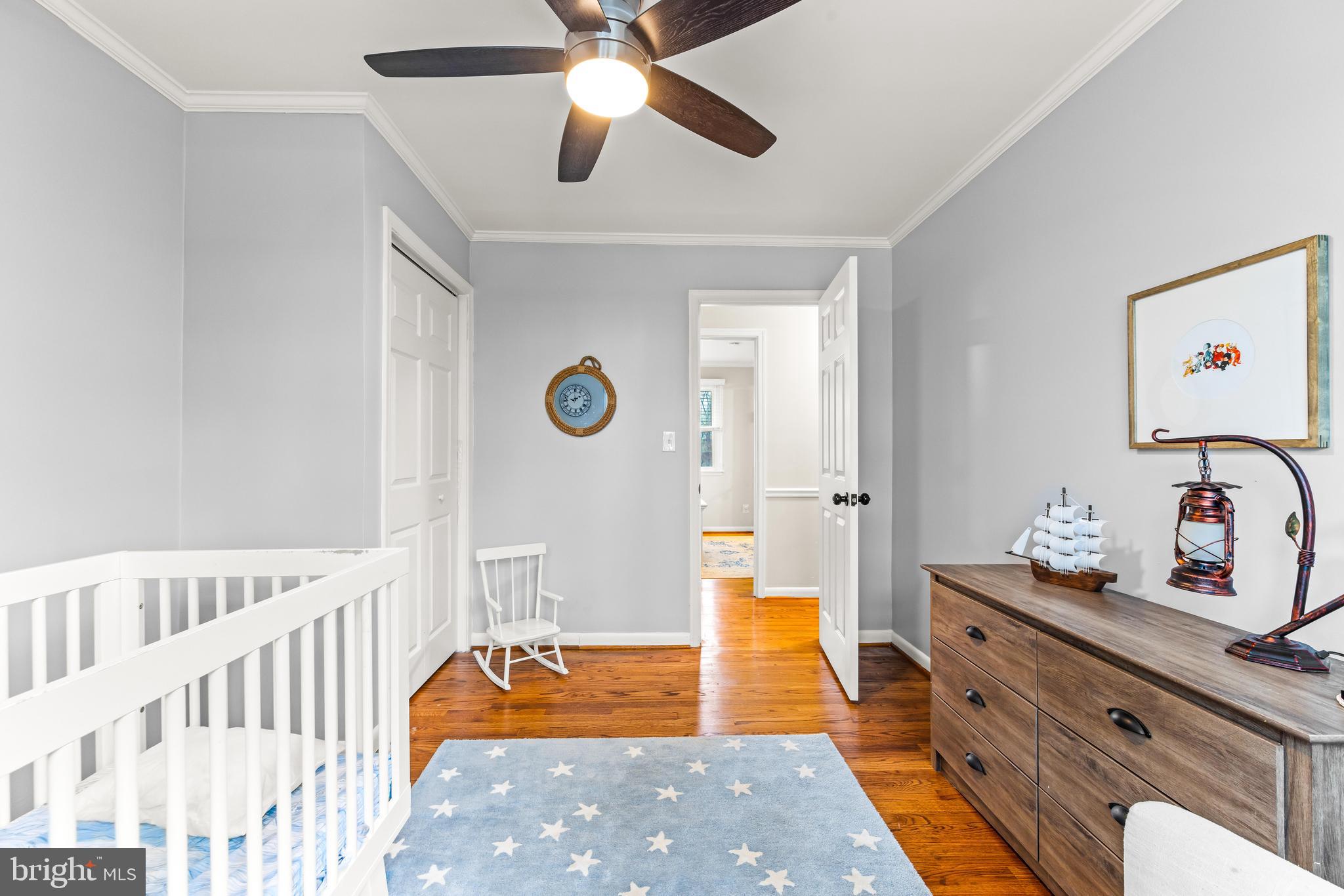 1205 Mill Creek Road Fallston, MD 21047 - Photo 27 of 53 a bedroom with a bed and a chandelier
