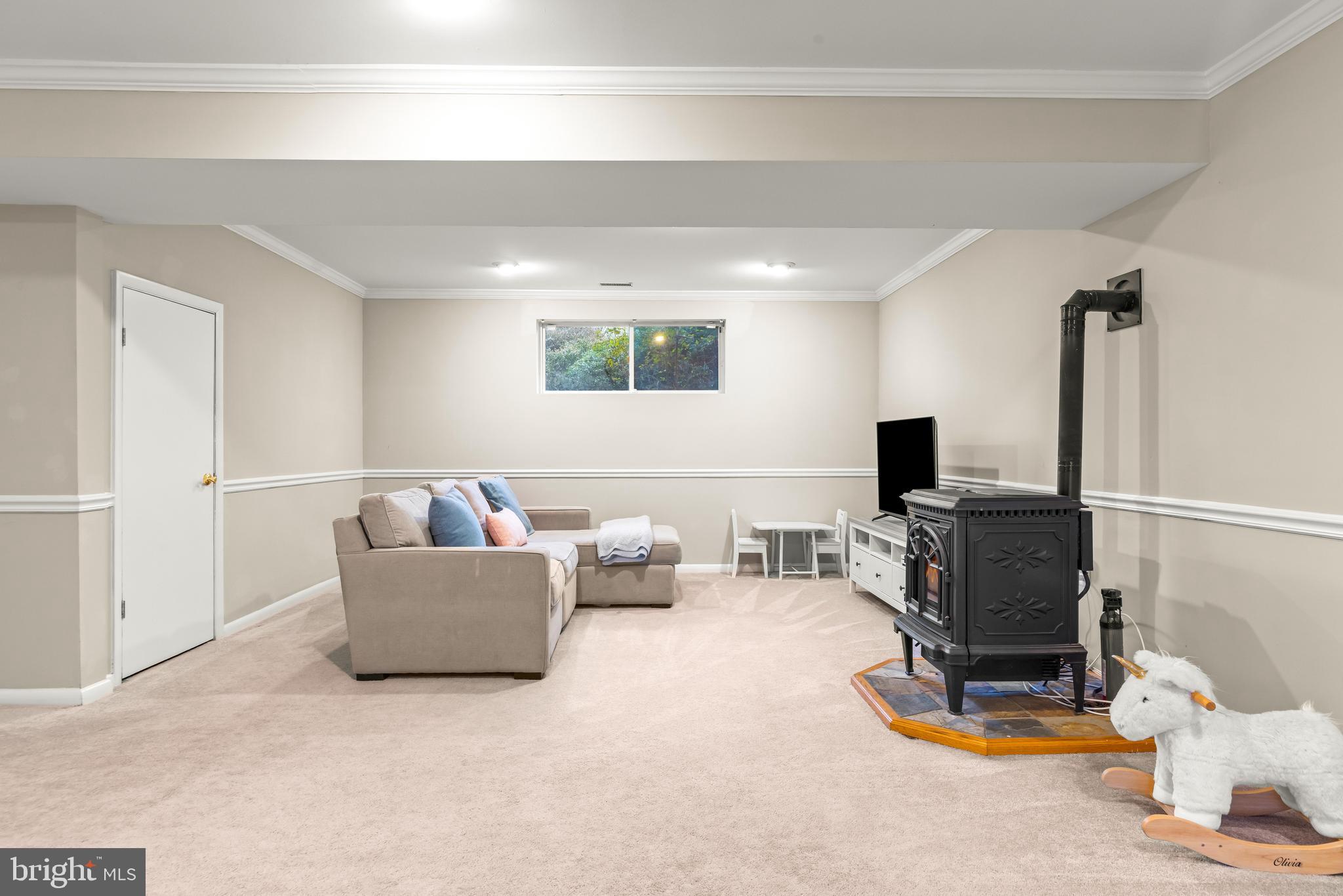 1205 Mill Creek Road Fallston, MD 21047 - Photo 34 of 53 a living room with furniture and a flat screen tv