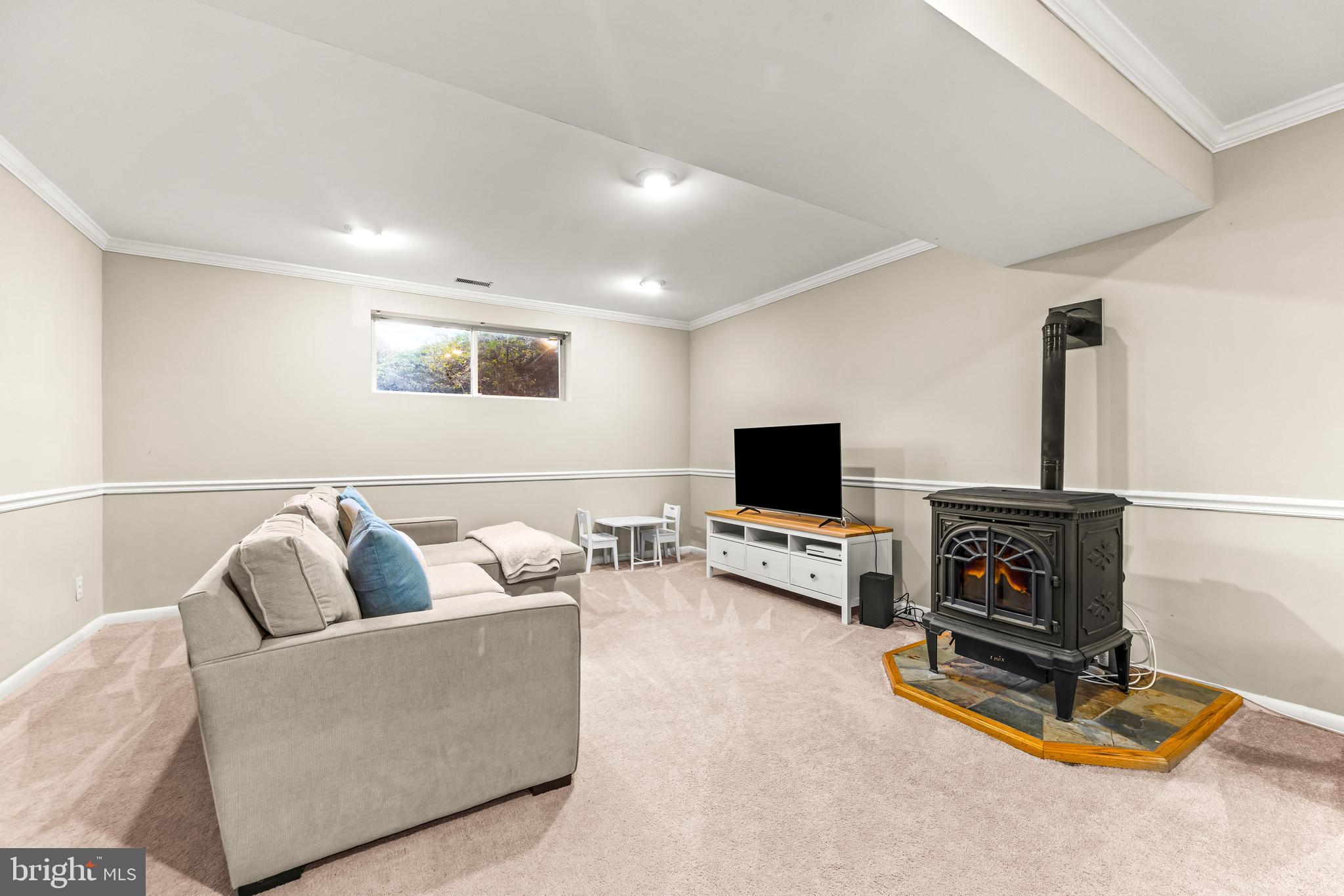 1205 Mill Creek Road Fallston, MD 21047 - Photo 35 of 53 a living room with furniture and a flat screen tv