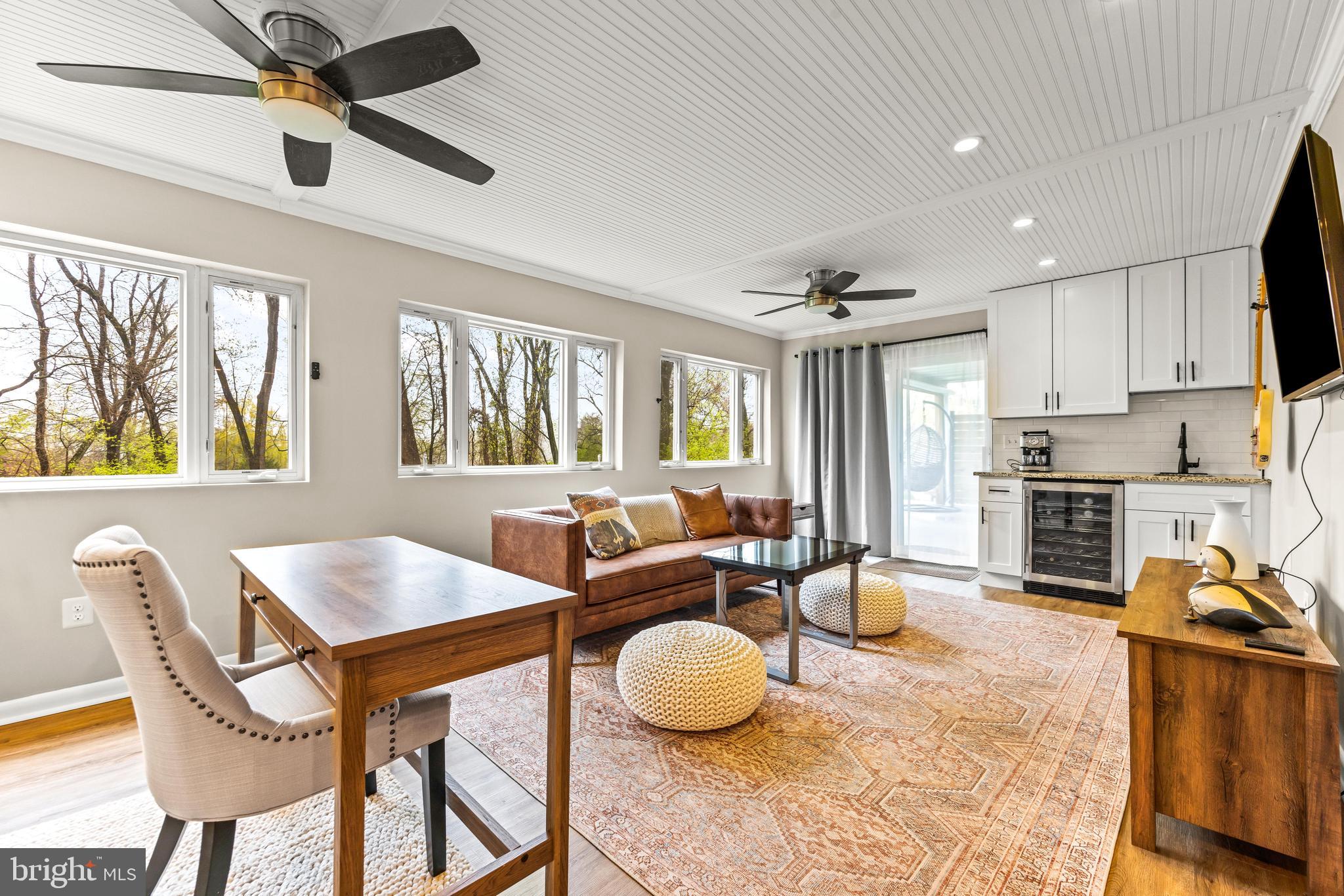 1205 Mill Creek Road Fallston, MD 21047 - Photo 44 of 53 a living room with furniture and a kitchen