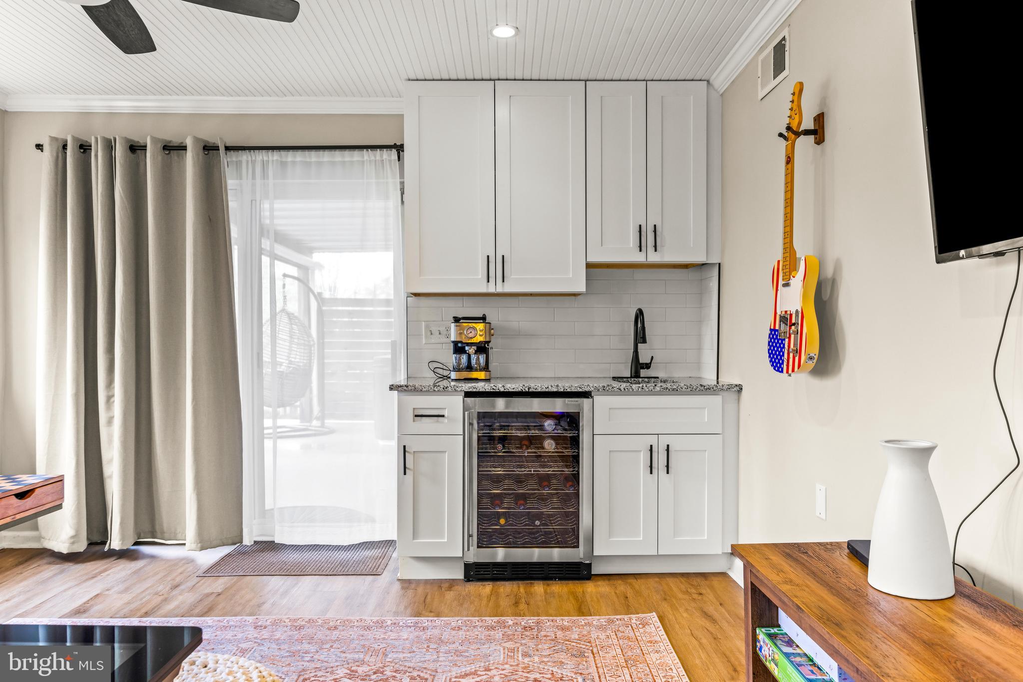 1205 Mill Creek Road Fallston, MD 21047 - Photo 46 of 53 a kitchen with stainless steel appliances granite countertop a refrigerator and a stove top oven