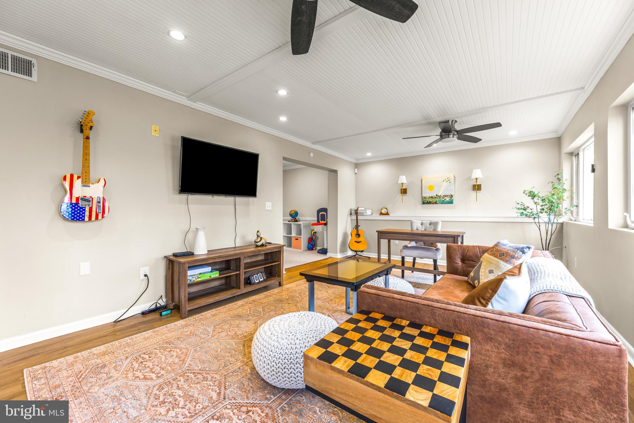 1205 Mill Creek Road Fallston, MD 21047 - Photo 47 of 53 a living room with furniture and a flat screen tv