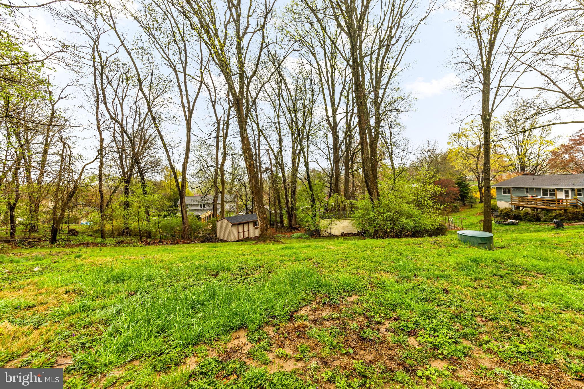 1205 Mill Creek Road Fallston, MD 21047 - Photo 52 of 53 a backyard of apartments with large trees