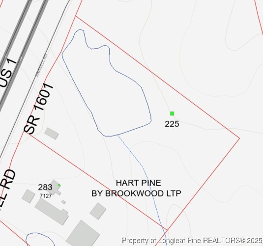 0 Saw Ml Road Cameron, NC 28326 - Photo 4 of 11 a picture of a book in a window