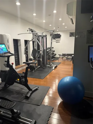a view of a room with gym equipment