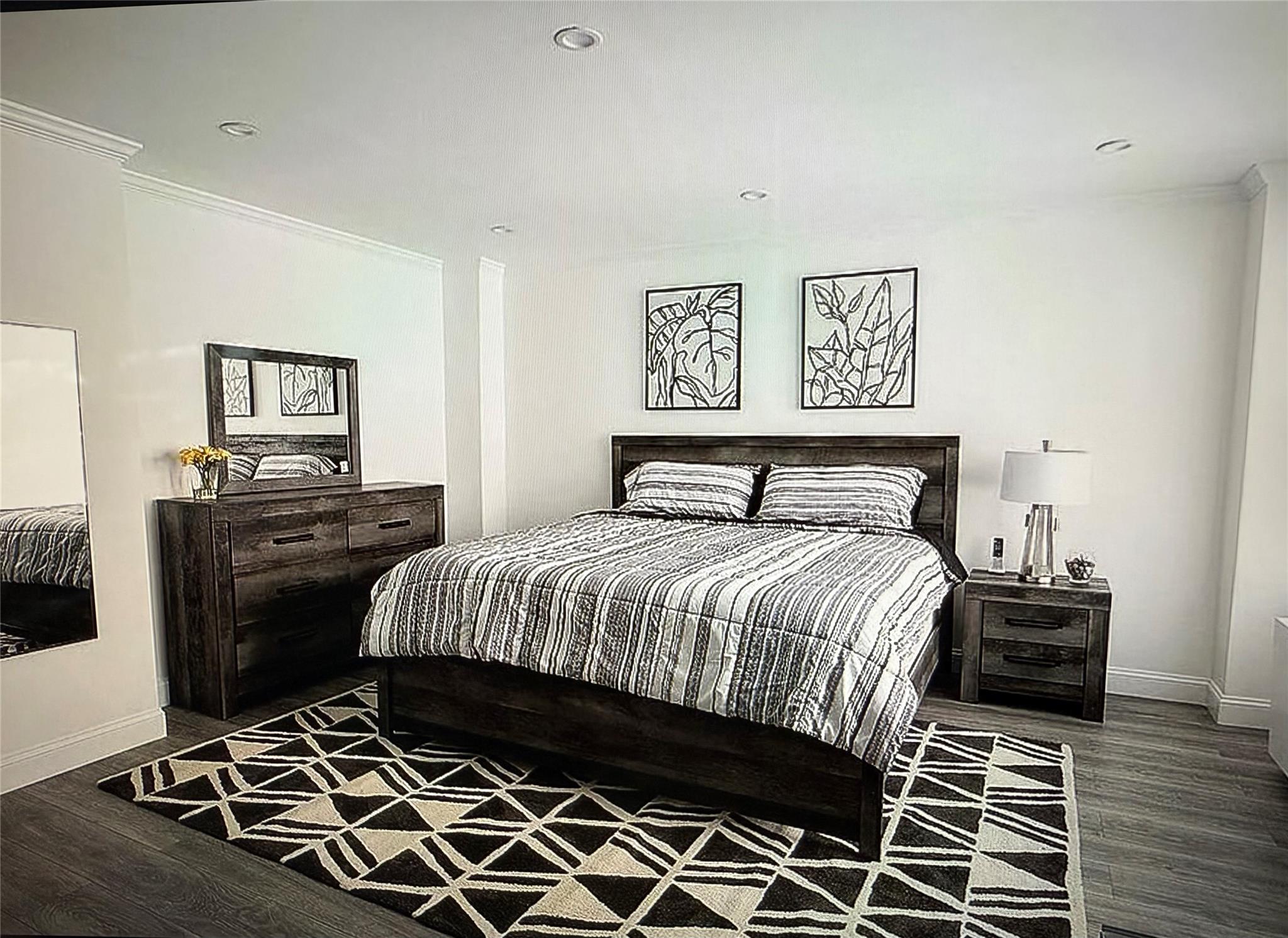 150 West 51st Street, Unit 1032 Manhattan, NY 10019 - Photo 5 of 19 a bedroom with a bed and a desk