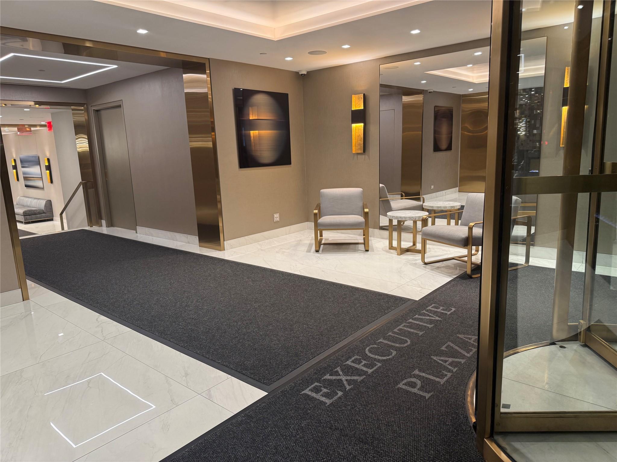 150 West 51st Street, Unit 1032 Manhattan, NY 10019 - Photo 10 of 19 a living room with furniture