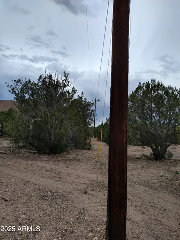 a view of mountain with sunset