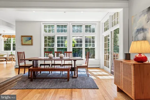 a living room with fireplace furniture and a fireplace