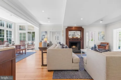 a living room with furniture and large window