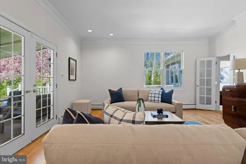 a bathroom with a granite countertop sink double vanity and a mirror