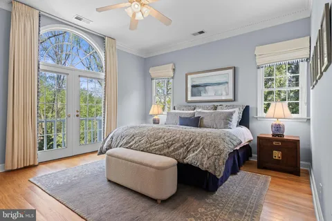 a bedroom with a bed and a couch