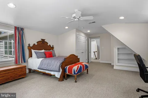 a view of an outside dining space with seating area