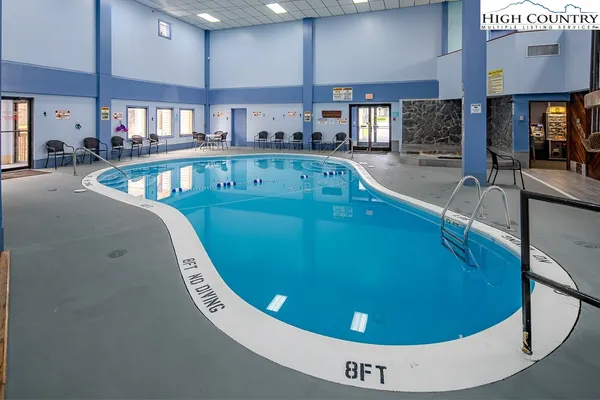 a view of a living room and bathroom