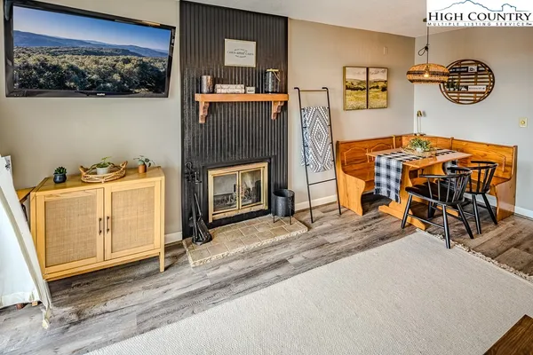 a living room with furniture and a table