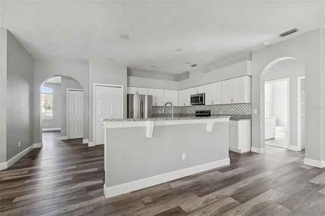 a view of a room that has a window in it