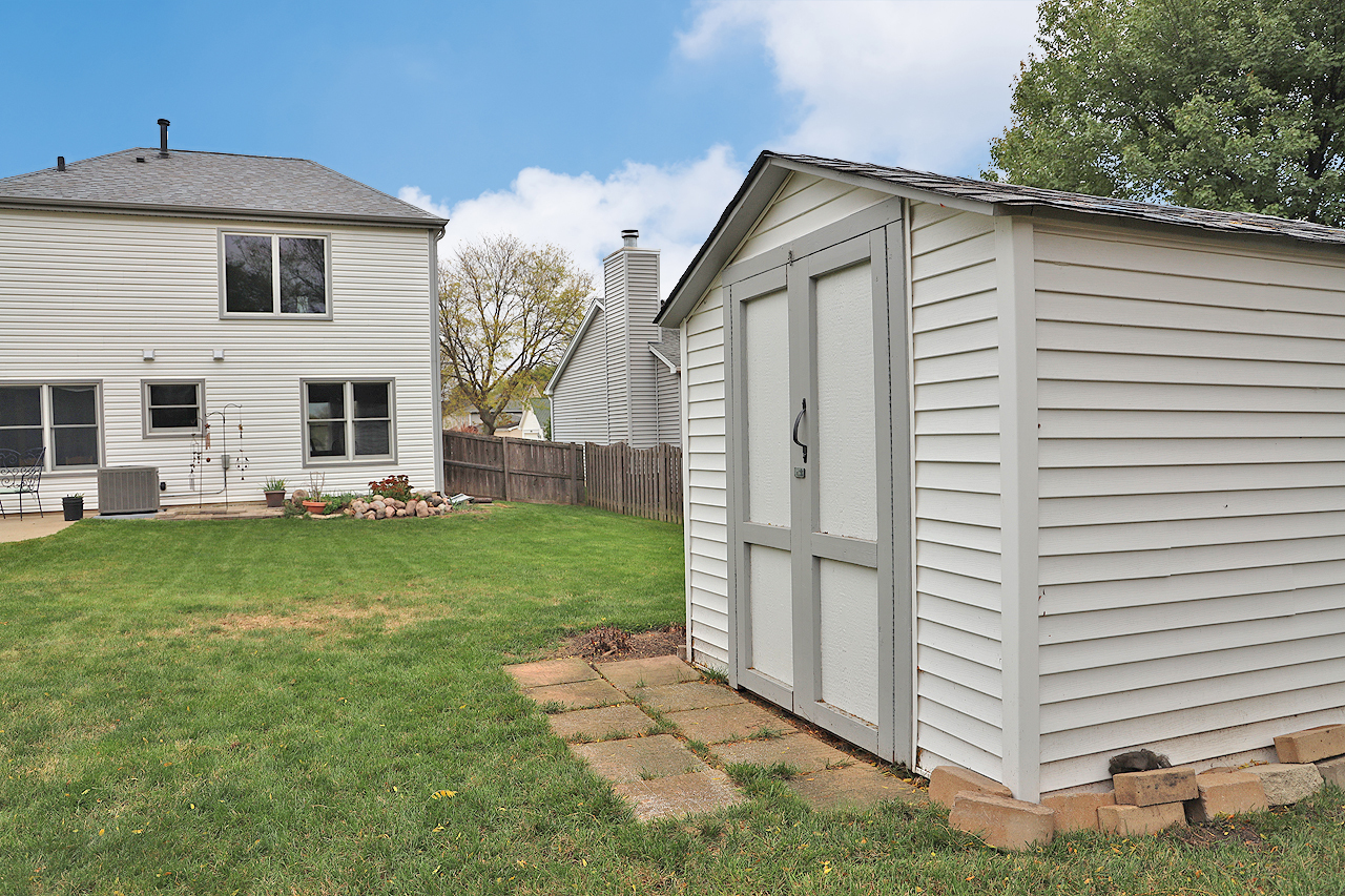 400 Barton Place Carol Stream, IL 60188 - Photo 44 of 45 a view of a house with a yard