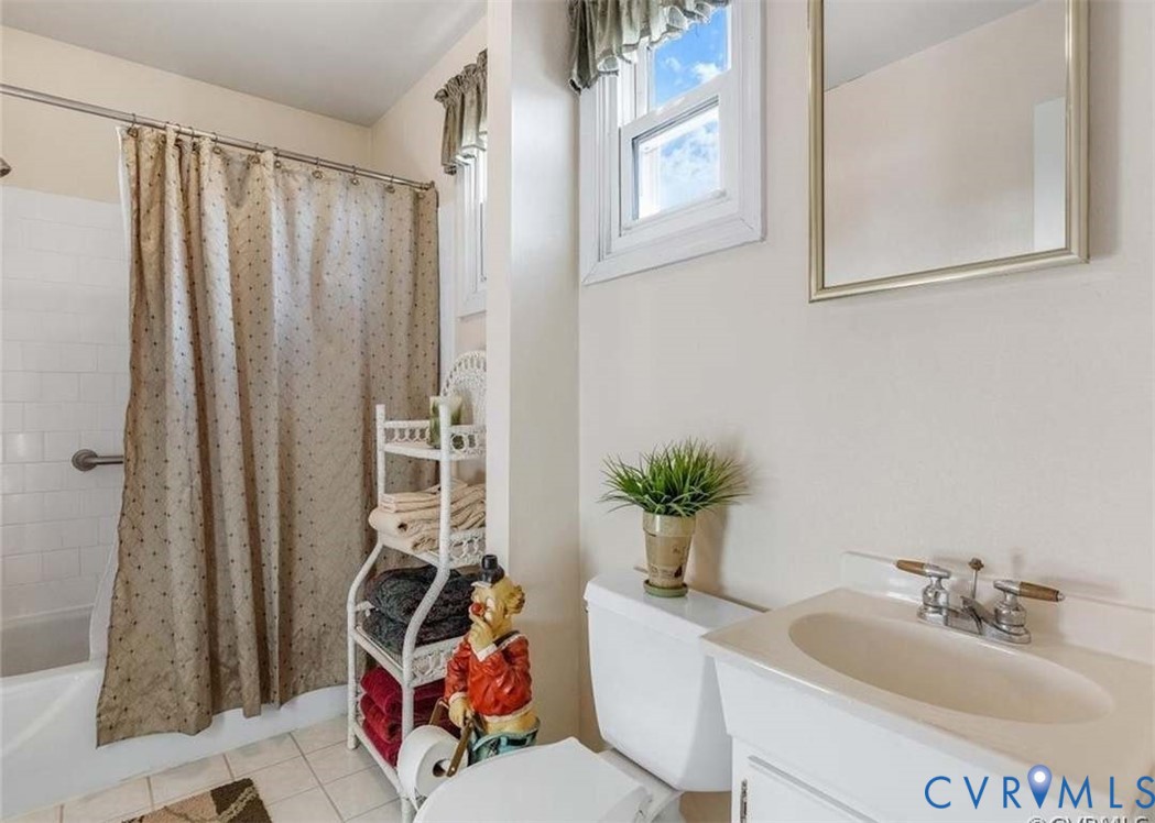 9003 Hungary Road Henrico, VA 23294 - Photo 15 of 25 Bright bathroom featuring ceramic tile flooring, a