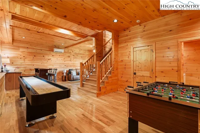 a large room with furniture and windows