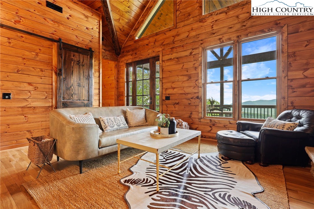 543 Broken Arrow Trail Boone, NC 28607 - Photo 5 of 46 a outdoor living space with patio furniture and garden view