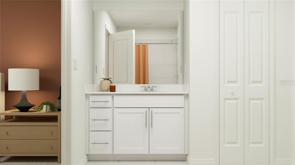 2422 Bluestone Road Haines City, FL 33844 - Photo 23 of 28 a bathroom with a sink and a mirror