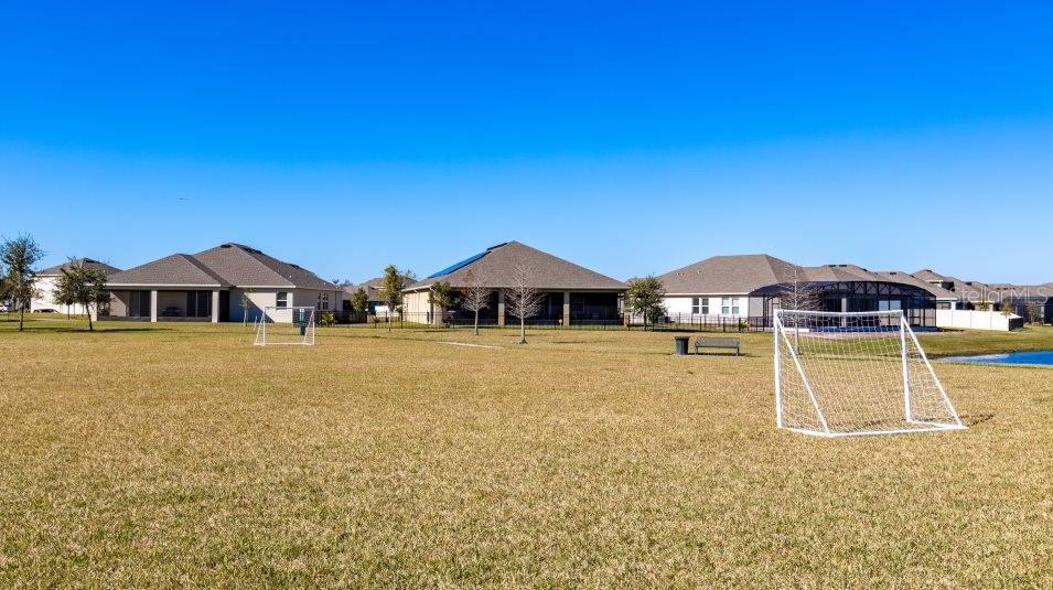 2422 Bluestone Road Haines City, FL 33844 - Photo 28 of 28 a front view of a house with swimming pool